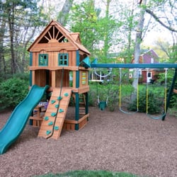 Broehl's Lawn & Landscaping - Broehl's recently dug out 6 inches of lawn and laid down playground matting for our kids' new swingset. Looks great!