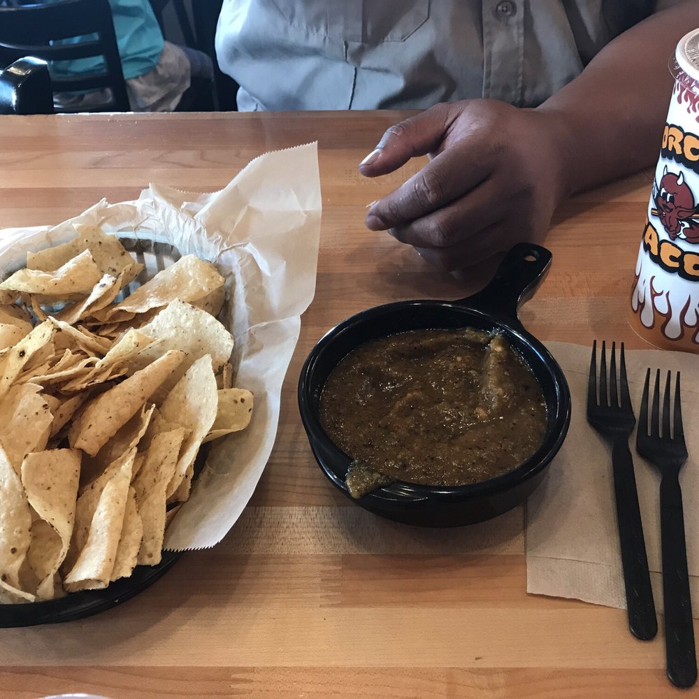Torchy's Tacos - Chips & Red Salsa, I felt like it was more of a green tomatillo salsa rather than red. - Tex-Mex Near Me - Denver, Colorado Torchy's Tacos - Chips & Red Salsa, I felt like it was more of a green tomatillo salsa rather than red. - Tex-Mex Near Me - Denver, Colorado