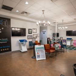Trilogy Wellness of Maryland - Welcoming lobby area with public restroom and seating area.