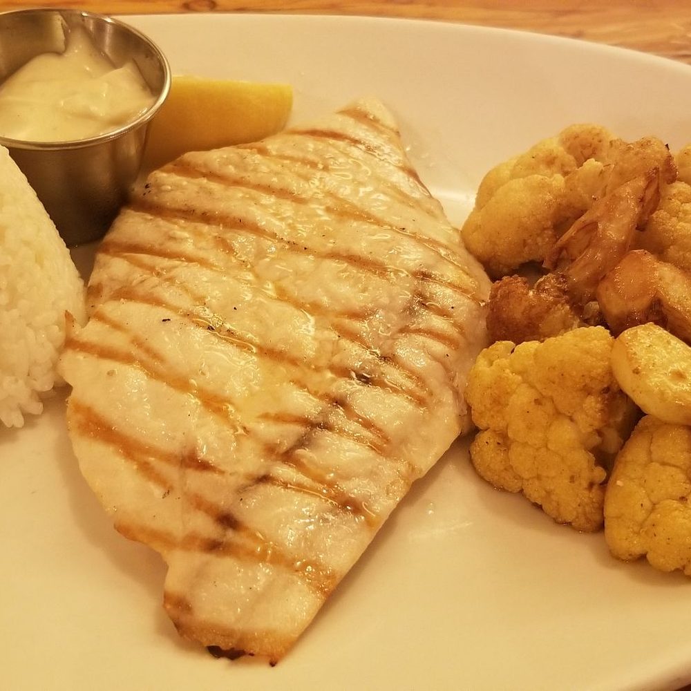 Fish 101 - Grilled Mahi-mahi with 2 sides (rice and curried cauliflower) their curried cauliflower is a must try! Try their local tap beers as well - Seafood Near Me - Encinitas, California Fish 101 - Grilled Mahi-mahi with 2 sides (rice and curried cauliflower) their curried cauliflower is a must try! Try their local tap beers as well - Seafood Near Me - Encinitas, California