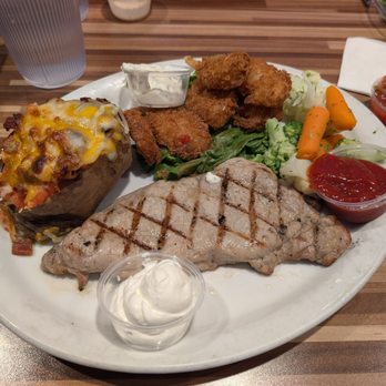 NORMS Restaurant - Steak and shrimp with baked potato. The steak was very tender and flavorful. - American Near Me - Las Vegas, Nevada NORMS Restaurant - Steak and shrimp with baked potato. The steak was very tender and flavorful. - American Near Me - Las Vegas, Nevada