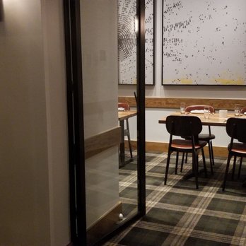 Courier Market Bar Kitchen - Seating that I assume can be turned into private reserved dining - New American Near Me - Denver, Colorado