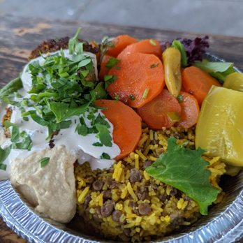 Newtown - a plate of food on a wooden table - Vegetarian Near Me - Brooklyn, New York