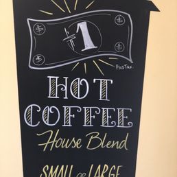 a sign for a small coffee shop
