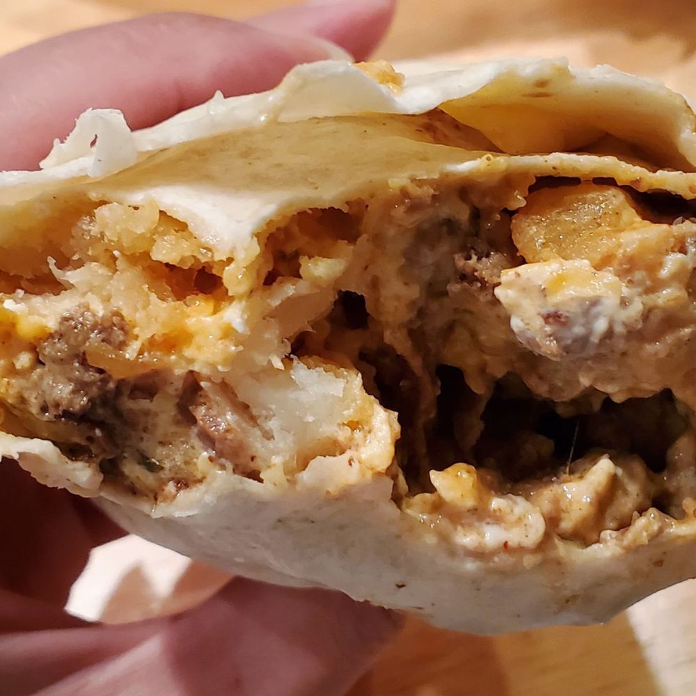 Del Taco - Epic Cali Bacon Burrito: Carne Asada Steak - No Sour Cream ($9.29) - Mexican Near Me - Folsom, California Del Taco - Epic Cali Bacon Burrito: Carne Asada Steak - No Sour Cream ($9.29) - Mexican Near Me - Folsom, California