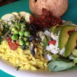 El Ameno - Yellow rice Paella with green peas, huitlacoche and veggies, coconut and cauliflower ceviche, served with chile guajillo beans