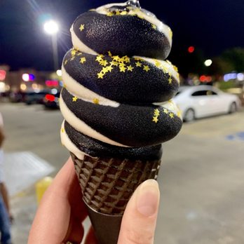 Bae - Charcoal pineapple and vanilla in a charcoal cone with gold stars - Ice Cream & Frozen Yogurt Near Me - Houston, Texas Bae - Charcoal pineapple and vanilla in a charcoal cone with gold stars - Ice Cream & Frozen Yogurt Near Me - Houston, Texas