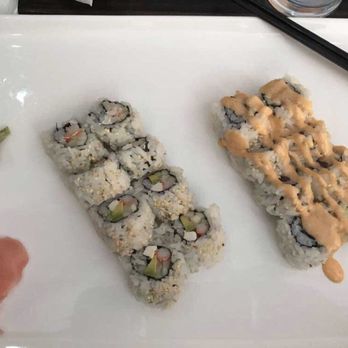 Tin Tin Cafe - Cream cheese California roll (left) and spicy tuna roll (right). - Sushi Bars Near Me - Charlotte, North Carolina Tin Tin Cafe - Cream cheese California roll (left) and spicy tuna roll (right). - Sushi Bars Near Me - Charlotte, North Carolina