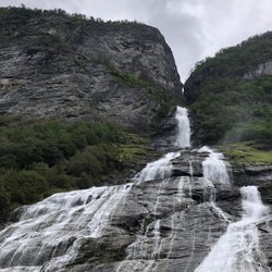 Geiranger Fjordsafari - View of the bachelor or suitor waterfall. Can make out absolut vodka bottle