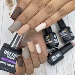 Gemini Nails - Medium length acrylics , matte and gloss French tip design