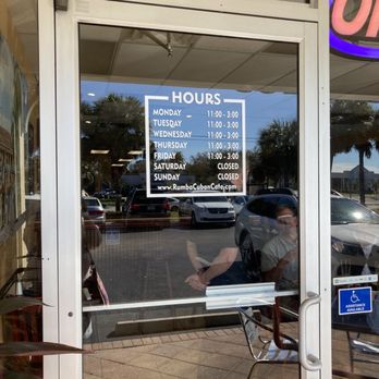 Rumba Cuban Cafe - a reflection of a man in the window - Cuban Near Me - Naples, Florida Rumba Cuban Cafe - a reflection of a man in the window - Cuban Near Me - Naples, Florida