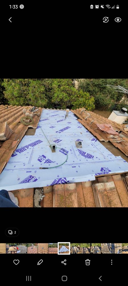 Slide of Courtesy Roofing Services