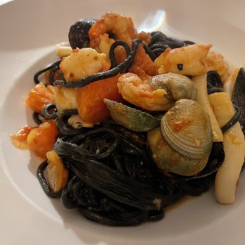 Novitá - Spaghettini Neri Ai Frutti Di Mare - Italian Near Me - New York, New York Novitá - Spaghettini Neri Ai Frutti Di Mare - Italian Near Me - New York, New York