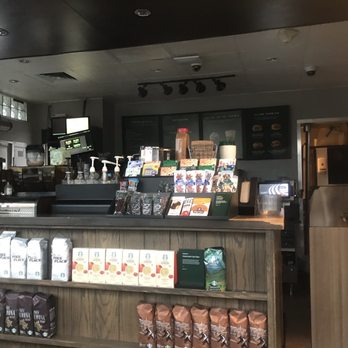Starbucks - a coffee shop counter with a variety of coffees - Coffee & Tea Near Me - Columbus, Ohio