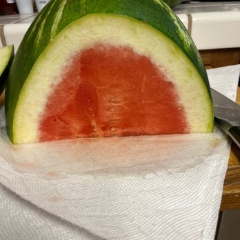 Baba Bazaar Fruitstand & Bakery - a watermelon cut in half - Farmers Market Near Me - Ripon, California Baba Bazaar Fruitstand & Bakery - a watermelon cut in half - Farmers Market Near Me - Ripon, California