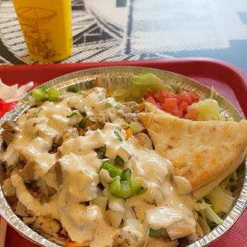 The Halal Guys - Regular Chicken Platter and White Sauce Packet To-Go. - Falafel Near Me - Cary, North Carolina