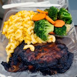 Bed Stuy Fish Fry - Chicken Dinner: $16 ($17.42 with tax). Two pieces of chicken and two sides. Shown with jerk chicken, Mac & cheese, broccoli and carrots