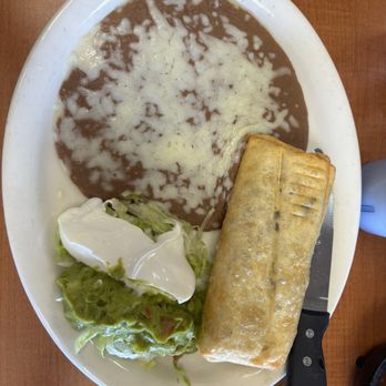 Luquins 454 - Steak Flauta with refried beans - Mexican Near Me - Hilo, Hawaii