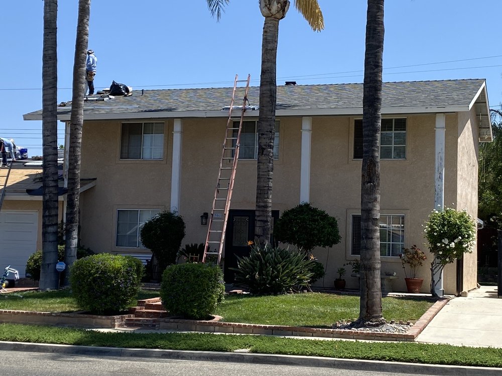 Slide of K & H Roofing