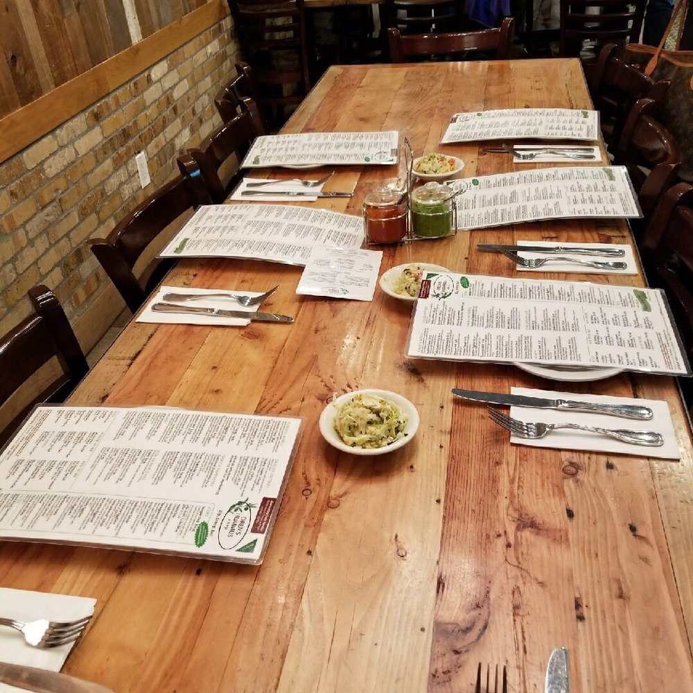 Oren's Hummus - You can see that table had just six menu cards and was set for six then seventh chair was added! - Mediterranean Near Me - Mountain View, California