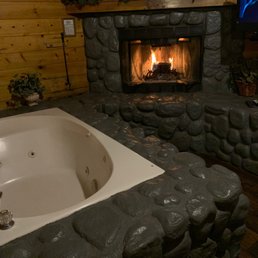 Fireplace and a jetted bath tub