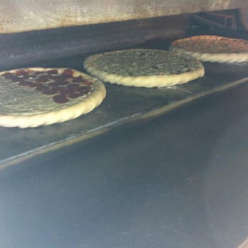 Old Town Pizza - Slices anyone! - Pizza Near Me - Naperville, Illinois