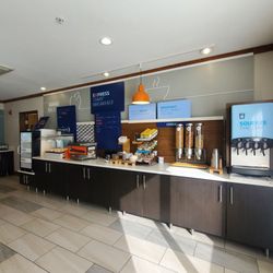 Holiday Inn Express & Suites Buffalo - Complimentary Breakfast Bar was excellent. Fresh biscuits and gravy, cheese omelets, bacon.