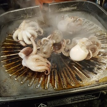 Gogi Time - Cooking the Octopus -- make sure to cook these really well - Korean Near Me - Oakland, California Gogi Time - Cooking the Octopus -- make sure to cook these really well - Korean Near Me - Oakland, California