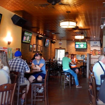 Sutherland's Food & Spirits - This bar is longer than it is wide, and has plenty of seating. - Burgers Near Me - Chicago, Illinois Sutherland's Food & Spirits - This bar is longer than it is wide, and has plenty of seating. - Burgers Near Me - Chicago, Illinois