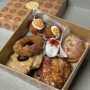 Half and Half Doughnut Co. - S'mores bombs, bananas foster, churro donut, cranberry raspberry bomb, pineapple fritter and chai old fashion - Coffee & Tea Near Me - Seattle, Washington Half and Half Doughnut Co. - S'mores bombs, bananas foster, churro donut, cranberry raspberry bomb, pineapple fritter and chai old fashion - Coffee & Tea Near Me - Seattle, Washington