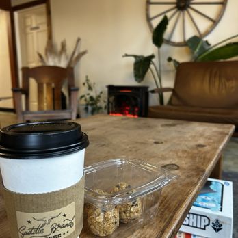 Saddle Brand - Valentine's Day custom drink (hazelnut, marshmallow and brown sugar in almond milk latte) with protein balls - Coffee & Tea Near Me - Pleasant Hill, Missouri Saddle Brand - Valentine's Day custom drink (hazelnut, marshmallow and brown sugar in almond milk latte) with protein balls - Coffee & Tea Near Me - Pleasant Hill, Missouri