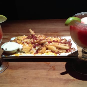 Cheddar's Scratch Kitchen - Bacon cheesy fries and strawberry margaritas with a sugar rim - Comfort Food Near Me - West Melbourne, Florida Cheddar's Scratch Kitchen - Bacon cheesy fries and strawberry margaritas with a sugar rim - Comfort Food Near Me - West Melbourne, Florida