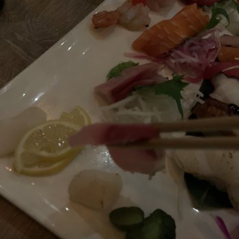 Sushi Rock - I can read my menu through this slice of sashimi - Sushi Bars Near Me - Arlington, Virginia