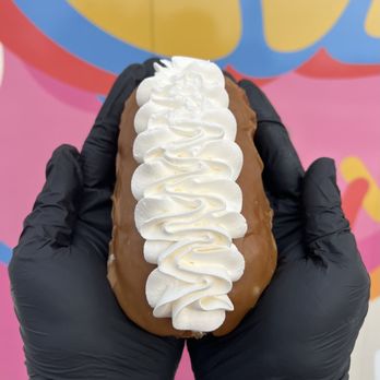 Glazed and Confused - The Hoser! A Bavarian cream filled donut, topped with maple glaze and vanilla cream! - Donuts Near Me - Scappoose, Oregon Glazed and Confused - The Hoser! A Bavarian cream filled donut, topped with maple glaze and vanilla cream! - Donuts Near Me - Scappoose, Oregon
