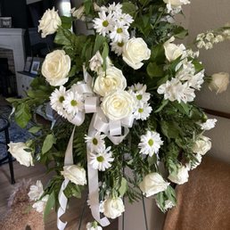 Large floral stand. Not full as pictured in brochure and already wilting the day of delivery