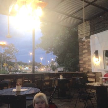 Burrito Amor - Seated at a spool table - Bars Near Me - Tulum, ROO