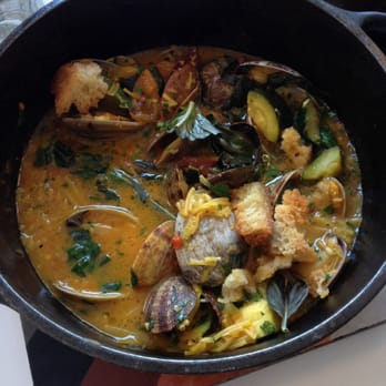 Fishing With Dynamite - The CLAMS SOFRITO: steamed clams in a glorious curry broth with some small pasta, zucchini, and focaccia croutons! Oh so good! - Seafood Near Me - Manhattan Beach, California