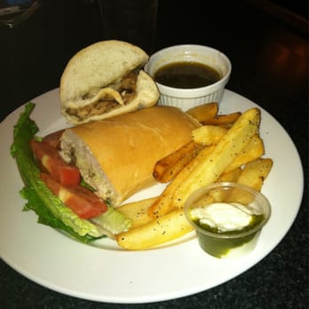 The Patio - Joel orders the veal pot roast po-boy with AuJus - Music Venues Near Me - Houma, Louisiana