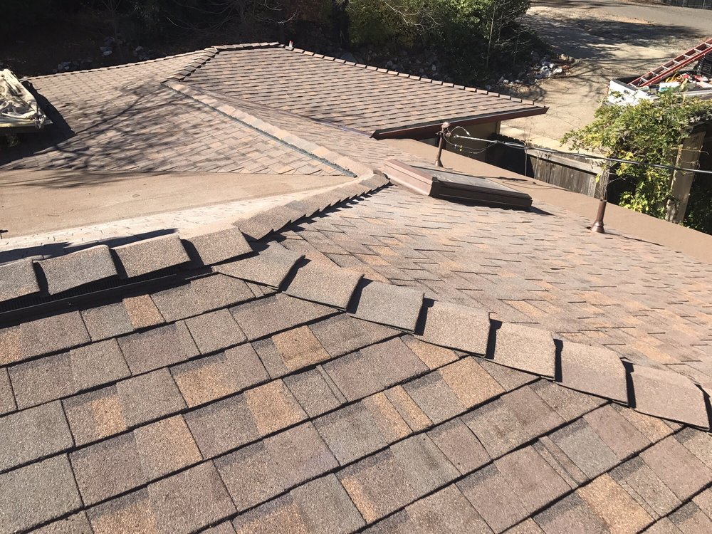 Slide of Kelly Roofing