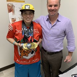 Coastline Orthopaedic Associates - Kristina "Yes I CAN" Yeh with Dr. Chambers. My 17 martial arts medals I won for the 2021 season