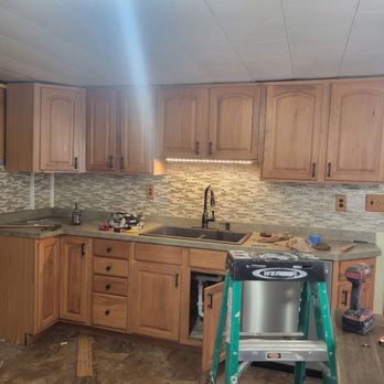 Residential Redevelopers - Prior picture of kitchen with beginning stages of remodel - General Contractors Near Me