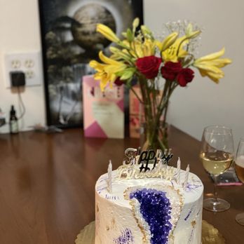 Sugar x Butter - a birthday cake on a table - Custom Cakes Near Me Sugar x Butter - a birthday cake on a table - Custom Cakes Near Me
