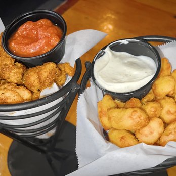 Jordan's Big Ten Pub - Cajun Dusted Popcorn shrimp & Cheese Curds - American Near Me - Madison, Wisconsin