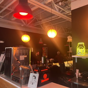 Black Lodge - a coffee shop counter with red lights - Coffee & Tea Near Me - Richmond, Virginia
