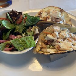 Shrimp tacos with side of greens.