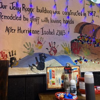 The Jolly Roger Restaurant and Bar - Jolly Roger wall. - Steakhouses Near Me - Kill Devil Hills, North Carolina
