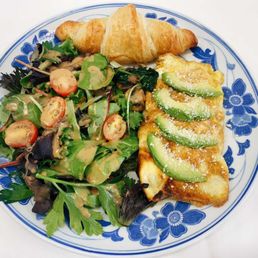 a blue and white plate of food