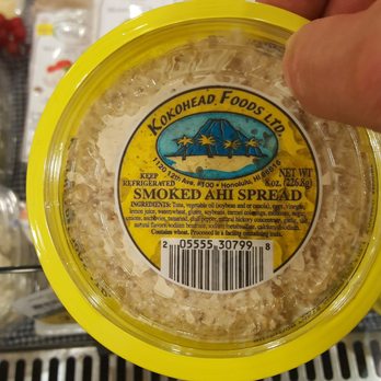 Kokohead Foods, Ltd - a hand holding a container of kokohead spread - Specialty Food Near Me - Honolulu, Hawaii Kokohead Foods, Ltd - a hand holding a container of kokohead spread - Specialty Food Near Me - Honolulu, Hawaii