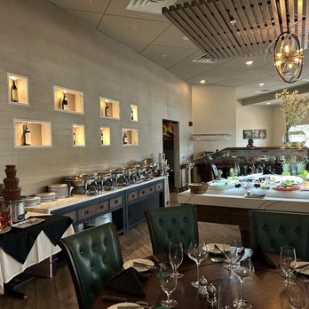 Adega Gaucha - The chafing dishes with hot offerings. - Steakhouses Near Me - Kissimmee, Florida Adega Gaucha - The chafing dishes with hot offerings. - Steakhouses Near Me - Kissimmee, Florida