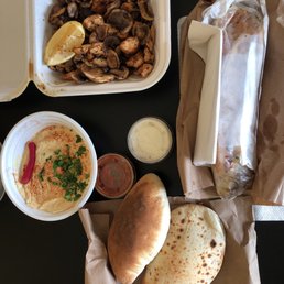 Chicken sautéed with mushroom, beef shawarma, bread and hummus Chicken sautéed with mushroom, beef shawarma, bread and hummus